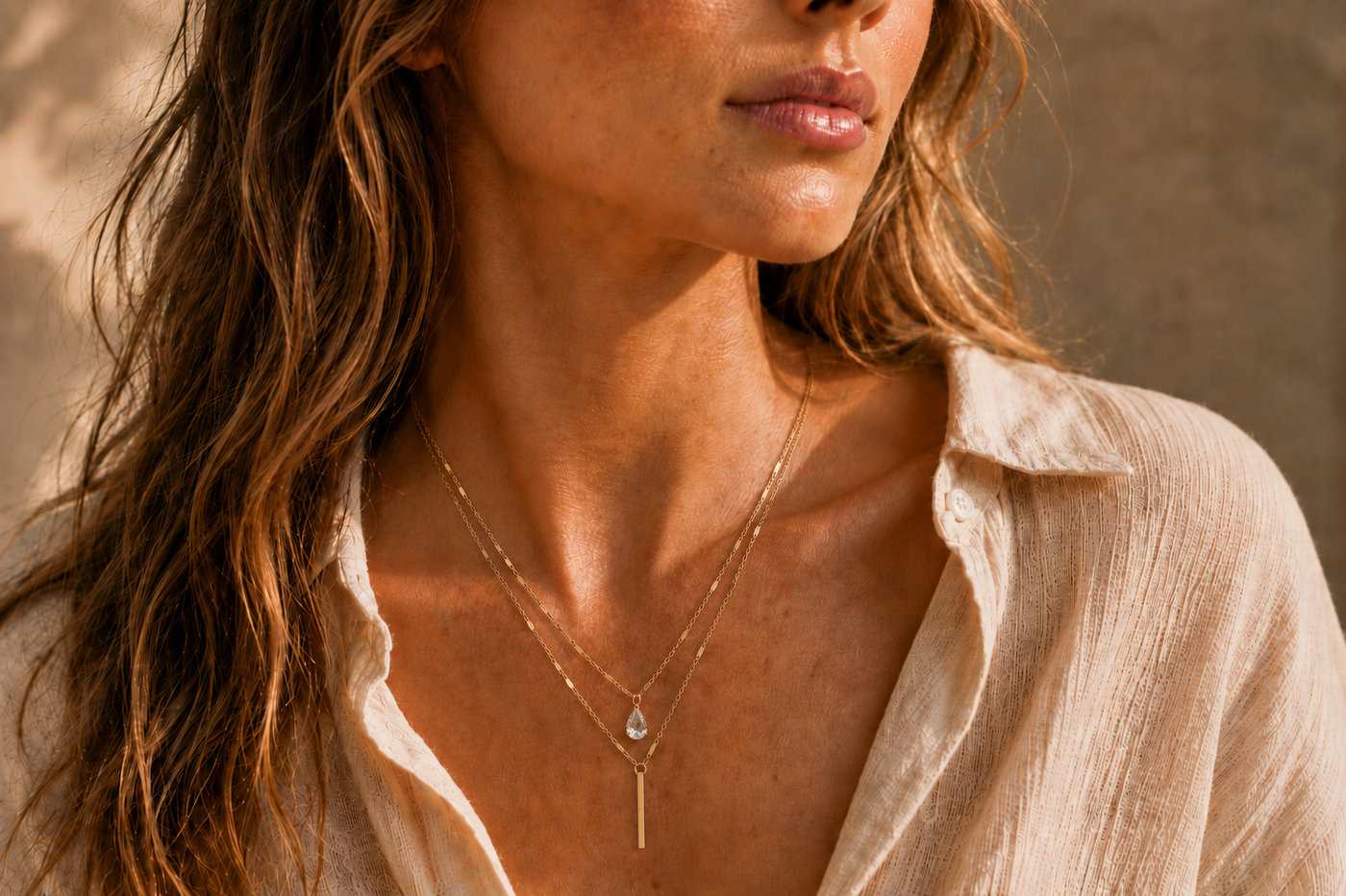 Collier Éclat – Double chaîne dorée & pierre goutte