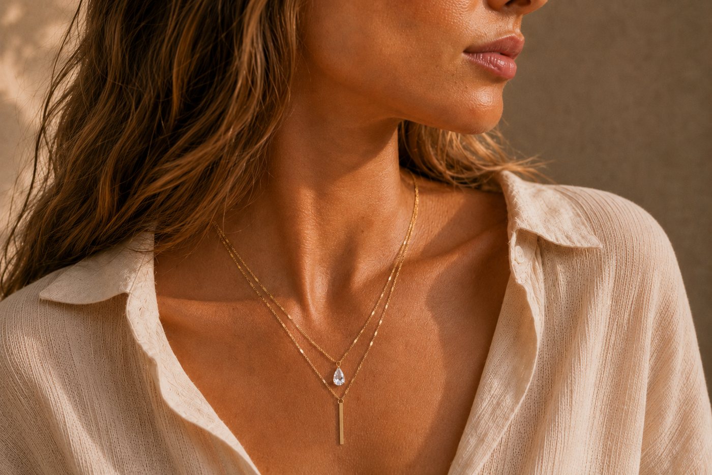 Collier Éclat – Double chaîne dorée & pierre goutte